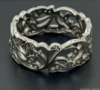 Ring angled showing floral filigree design