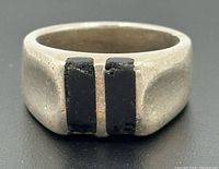 Front view of sterling silver signet ring with dual black inlay