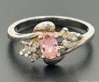front view showing pink topaz and accent stones