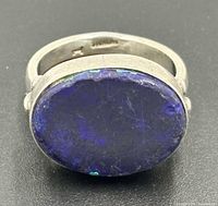Front view of sterling silver ring showing oval lapis lazuli stone