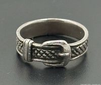 Front view of textured belt buckle sterling ring