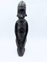 Front view of entire ebony figurine