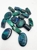 Group of azurite beads displaying shapes and colouration