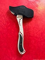 Hatchet front with sheath on, full length view