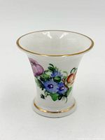 Front view showing full vase and floral design