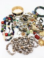 overview of entire jewelry lot showing major pieces and loose findings