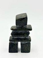 Front view of soapstone inukshuk showing overall form and color