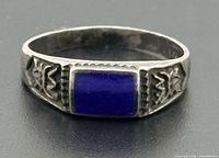 Top view of ring showing lapis lazuli inlay and engraved shoulders