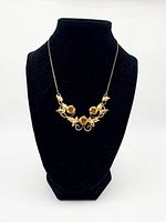 Necklace on display bust showing design and condition