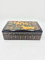 Closed box front/side showing overall design and star pattern