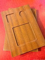 Front view showing recessed wells on teak boards