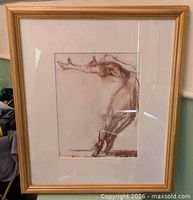 Front view of framed ballet dancer drawing
