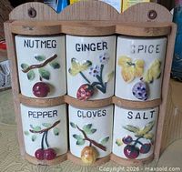 frontal view showing full rack, all six labeled drawers, fruit pulls and mounting scalloped top