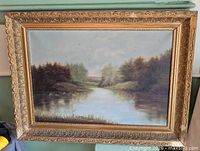 Front view of framed oil painting showing entire artwork and frame