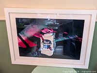 Full view of framed print showing artwork, frame and glazing