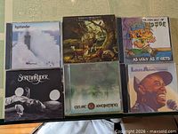 All six CD covers arranged in two rows