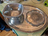Oval tray, square bowl, round rim visible