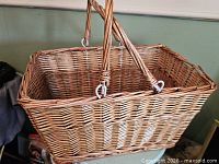 Overall view of wicker basket showing shape and handles