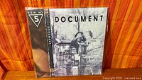 Front cover of R.E.M. Document LP in shrink