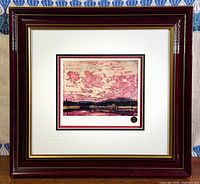 Front view of framed print showing entire frame and mat