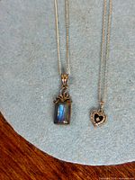 Front view of both pendant necklaces