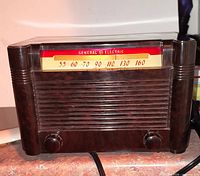 Front view showing Bakelite cabinet, tuning dial 55-160, two knobs