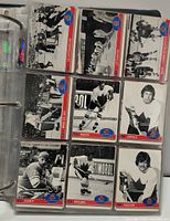 binder page with 1972 Summit Series O-Pee-Chee cards featuring Team Canada and Soviet players