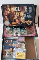 Open game showing box lid with Firefly artwork and game board