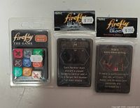 Firefly Ship Dice blister and two sealed Out to the Black card packs