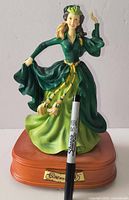 Front view of Gone with the Wind music box showing figurine, base, and plaque