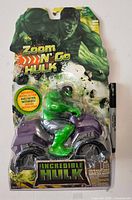 Front view of sealed Hulk Zoom 'N Go toy on card with marker for scale