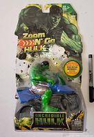 Front view of sealed Incredible Hulk Zoom 'N' Go motorcycle toy on blister card
