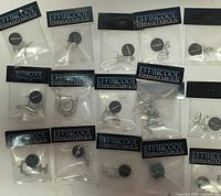 all 16 sealed Effincool Miniatures packs laid out