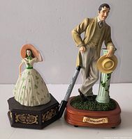 Scarlett and Rhett Gone with the Wind music box figurines with pen for scale