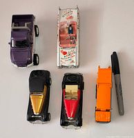 Group shot of all five die-cast vehicles