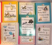 Front view of all seven Winnie-the-Pooh hardcover storybooks