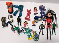 All mixed figures and toys displayed on flat surface