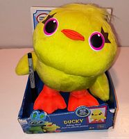 Front view of Ducky talking plush inside original Toy Story 4 display box