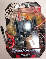Front of blister-carded Transformers/Star Wars Darth Vader TIE Advanced figure