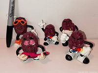 Group of five California Raisins PVC figurines