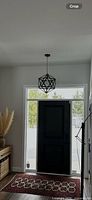 Pendant installed in entryway showing design and approximate scale