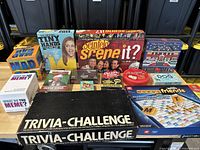 All games laid out on table, front view