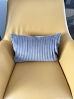 Front view showing pleated grey velvet texture