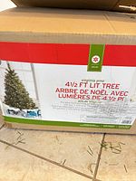 Retail box showing model information for 4.5 ft Virginia Pine lit tree