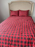 Comforter and two shams on bed showing overall appearance