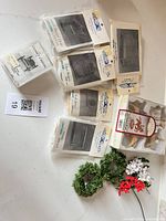 Overview of all sealed kits, boxed wood animals, wreaths and flowers