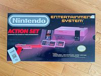 Front of NES Action Set box displaying graphics and condition