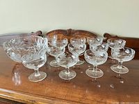 Full set: punch bowl and twelve matching glasses displayed together