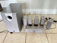 Full set: subwoofer, center speaker, four satellites with wires