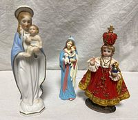 Group shot of all three religious figurines